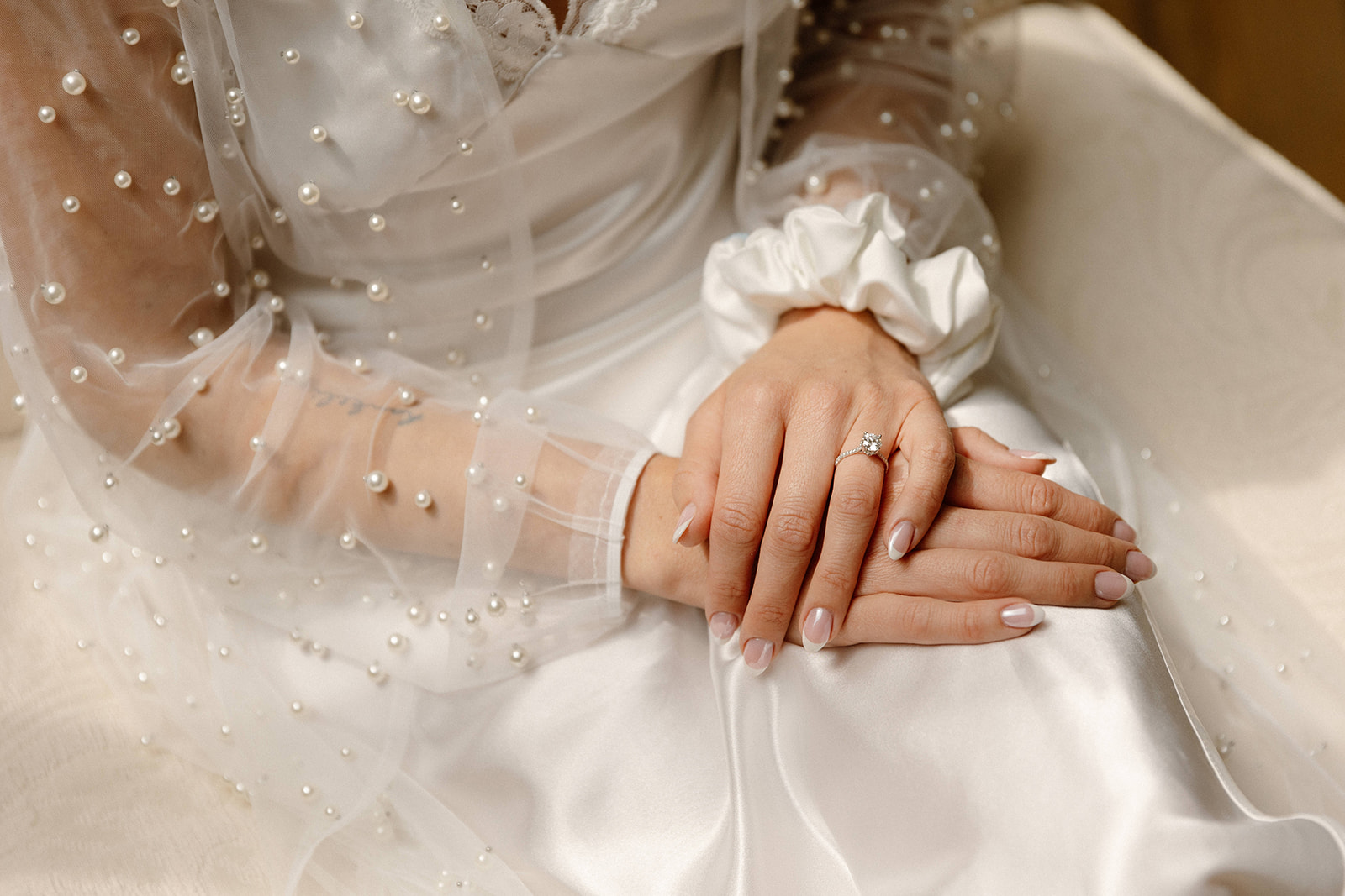 Brides robe and ring during getting ready portraits