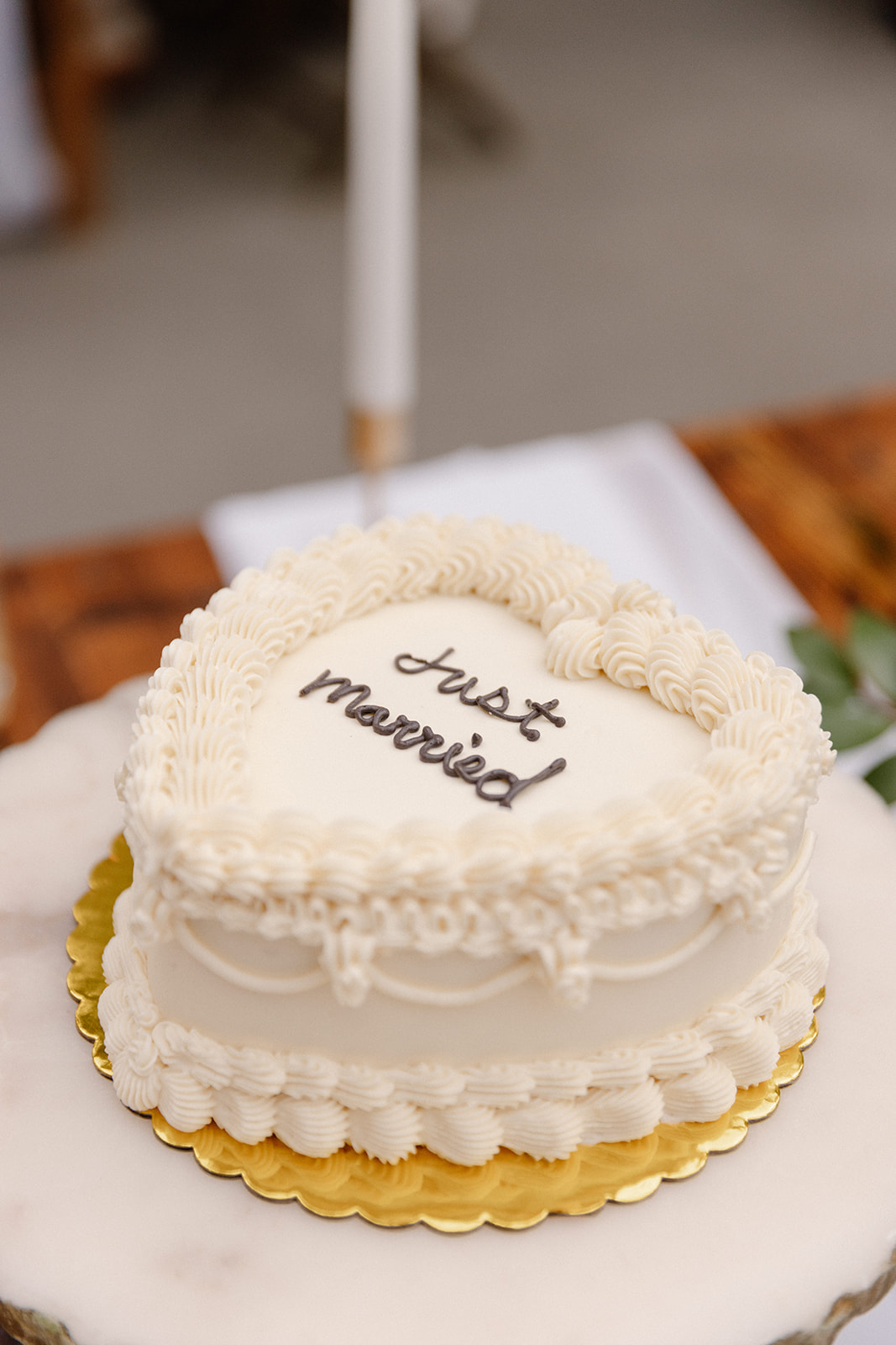 The wedding cake beautifully decorated and displayed at The Griffin House.