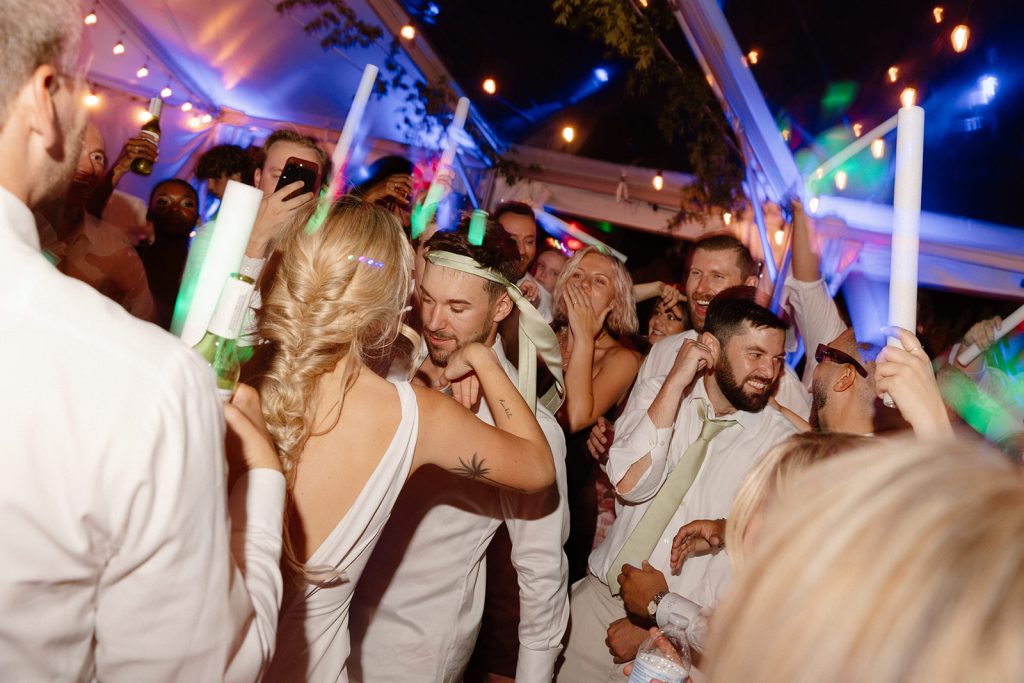 Guests enjoying a lively group dance at The Griffin House, capturing the fun of the celebration.