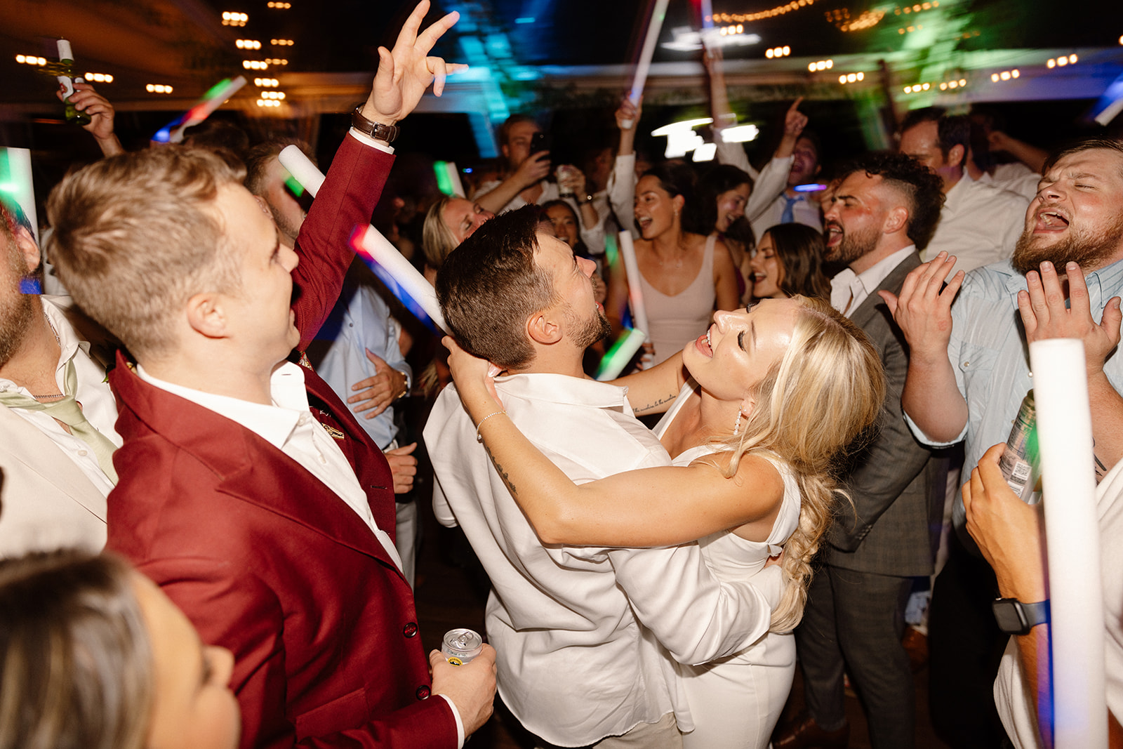 Couple singing along to their favorite song, creating unforgettable memories while dancing at The Griffin House.