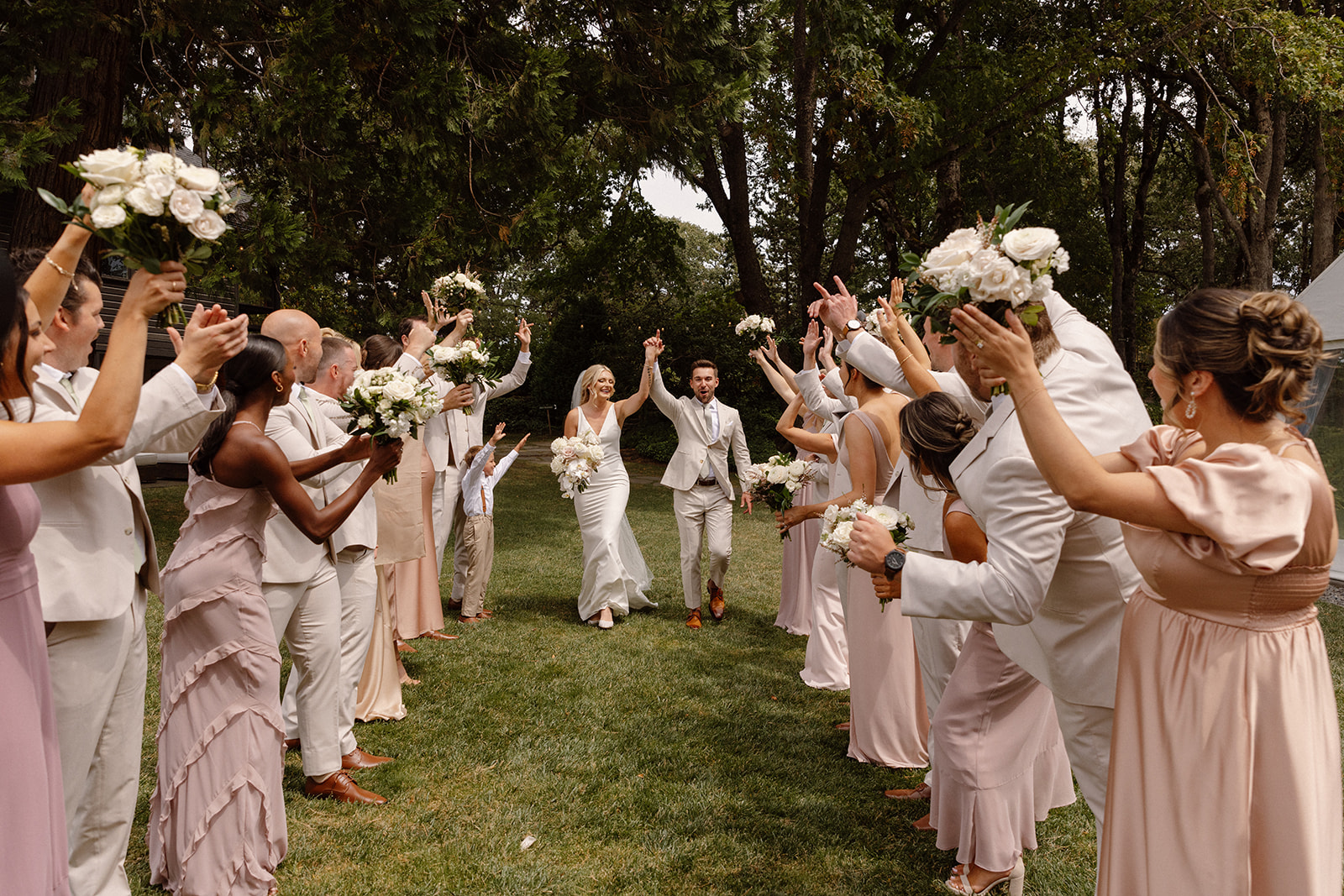 Large wedding party on the lawn at the griffin house