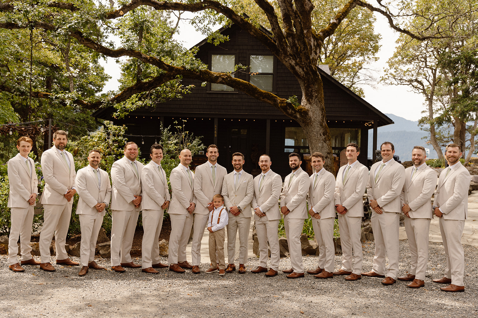 groomsmen in front of the griffin house