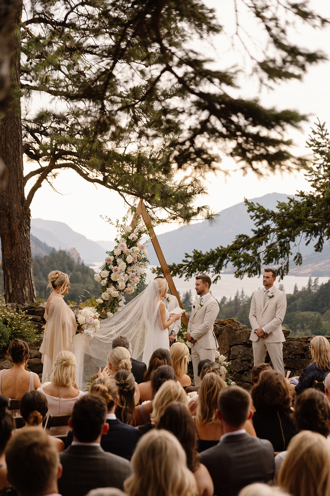 Bride reading her vows during the ceremony at the griffin house.