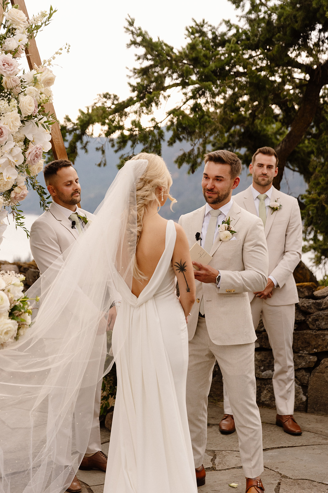 Anna and Michael exchanging vows surrounded by family and friends at The Griffin House.